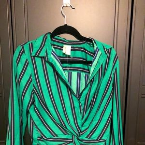 An elegant green and black stripe long sleeve top